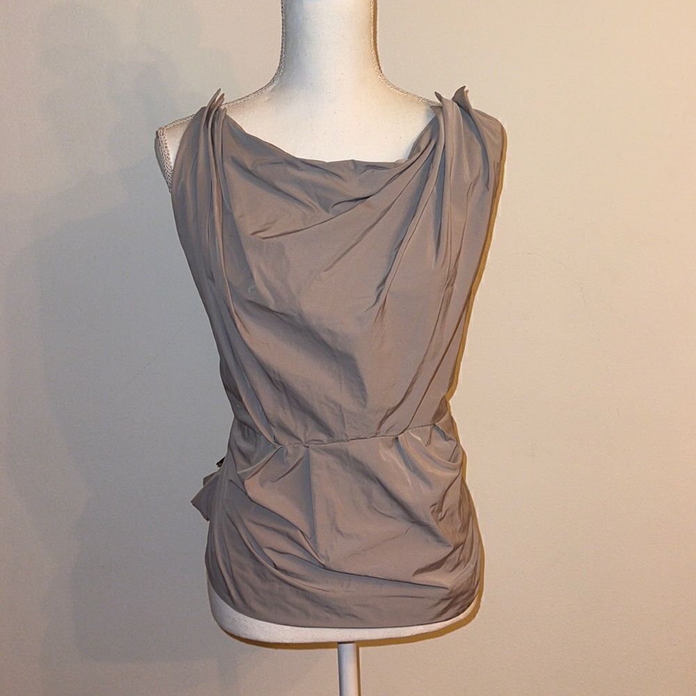 Cute grey top for a night out. Ties in back . Very flattering!